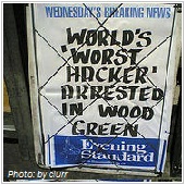 sign says world's worst hacker arrested
